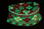 knitting in neon colors with light reflective thread knitted in